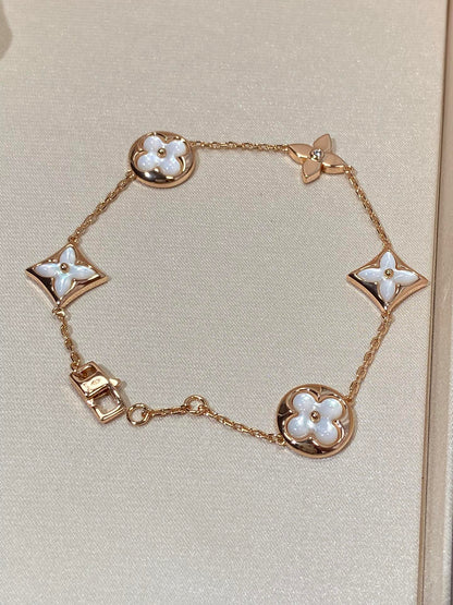 [Noble Jewelry]STAR AND SUN 5 MOTIF MOP PINK GOLD BRACELET