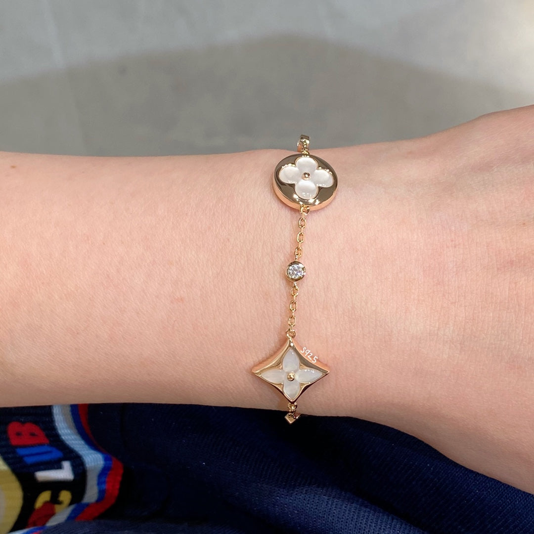 [Noble Jewelry]STAR AND SUN 4 MOTIF WHITE MOP PINK GOLD BRACELET