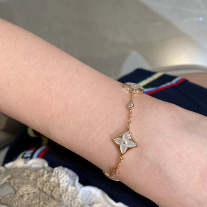 [Noble Jewelry]STAR AND SUN 4 MOTIF WHITE MOP PINK GOLD BRACELET